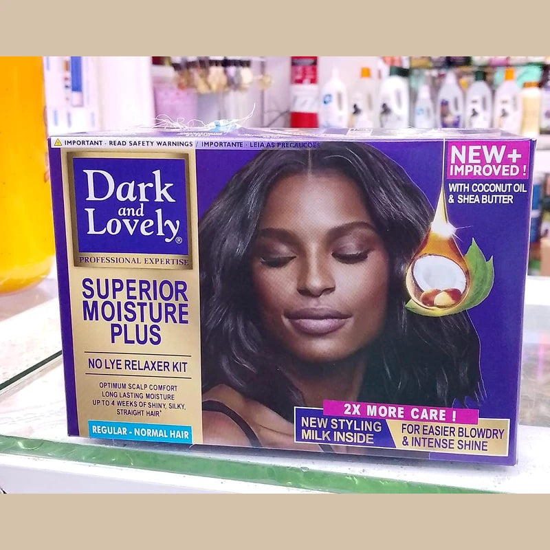 Box of Dark and Lovely hair product with a woman's face on it, displayed in a store setting.