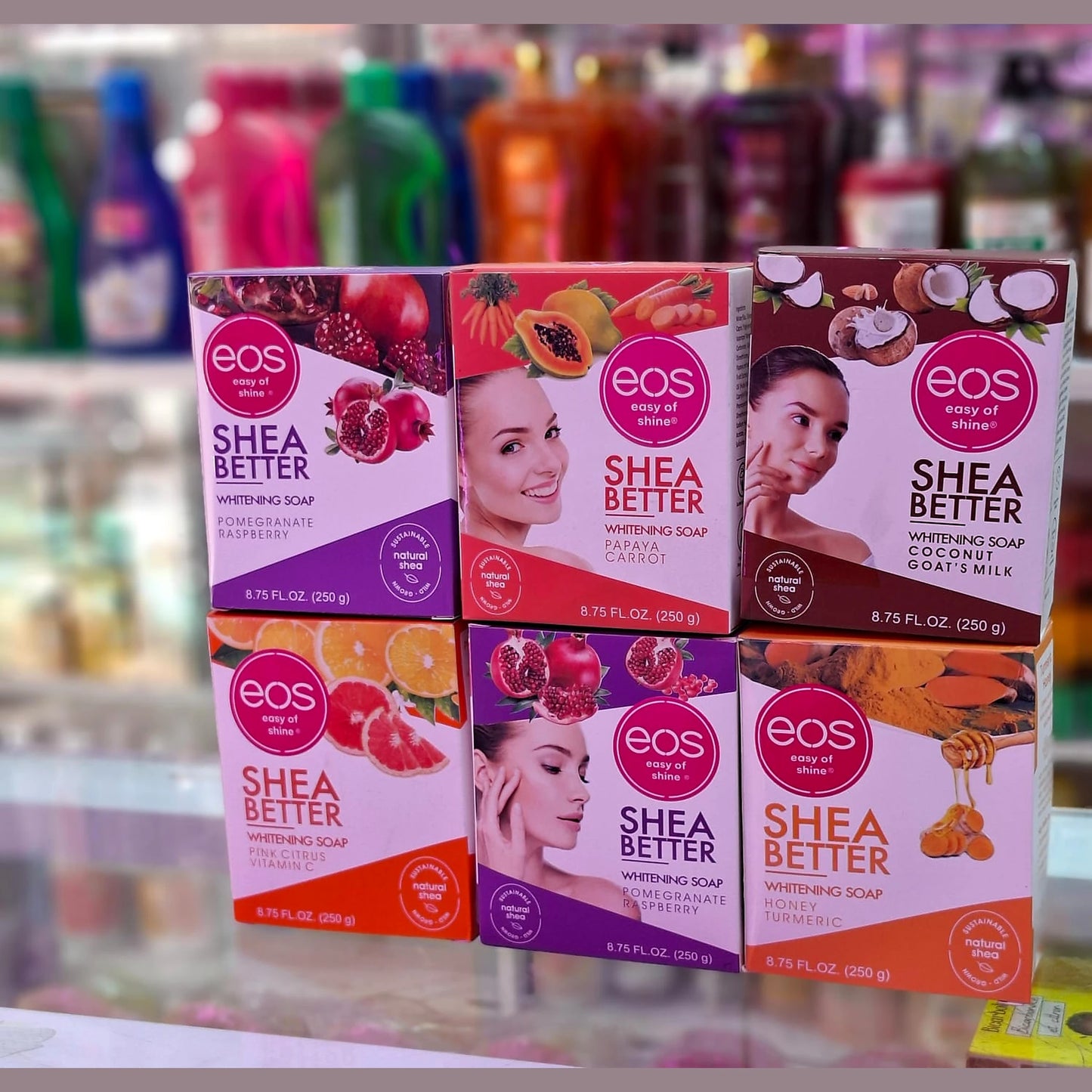 Six boxes of eos Shea Better soap on a shelf with a blurred background
