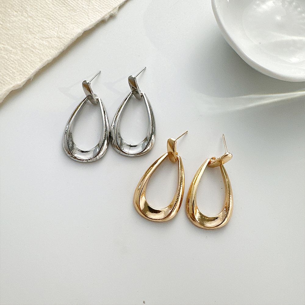 Europe and the United States new earrings light luxury high sense hollow drop ins geometric oval earrings for women drop earrings