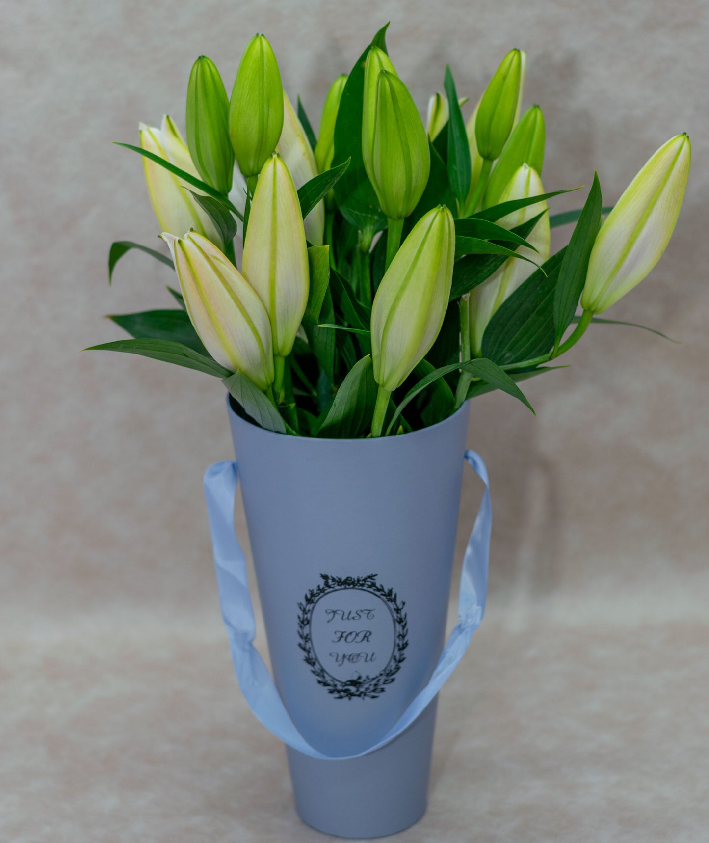 Flower Bouquet of Tiger Lilies in a Blue Vase