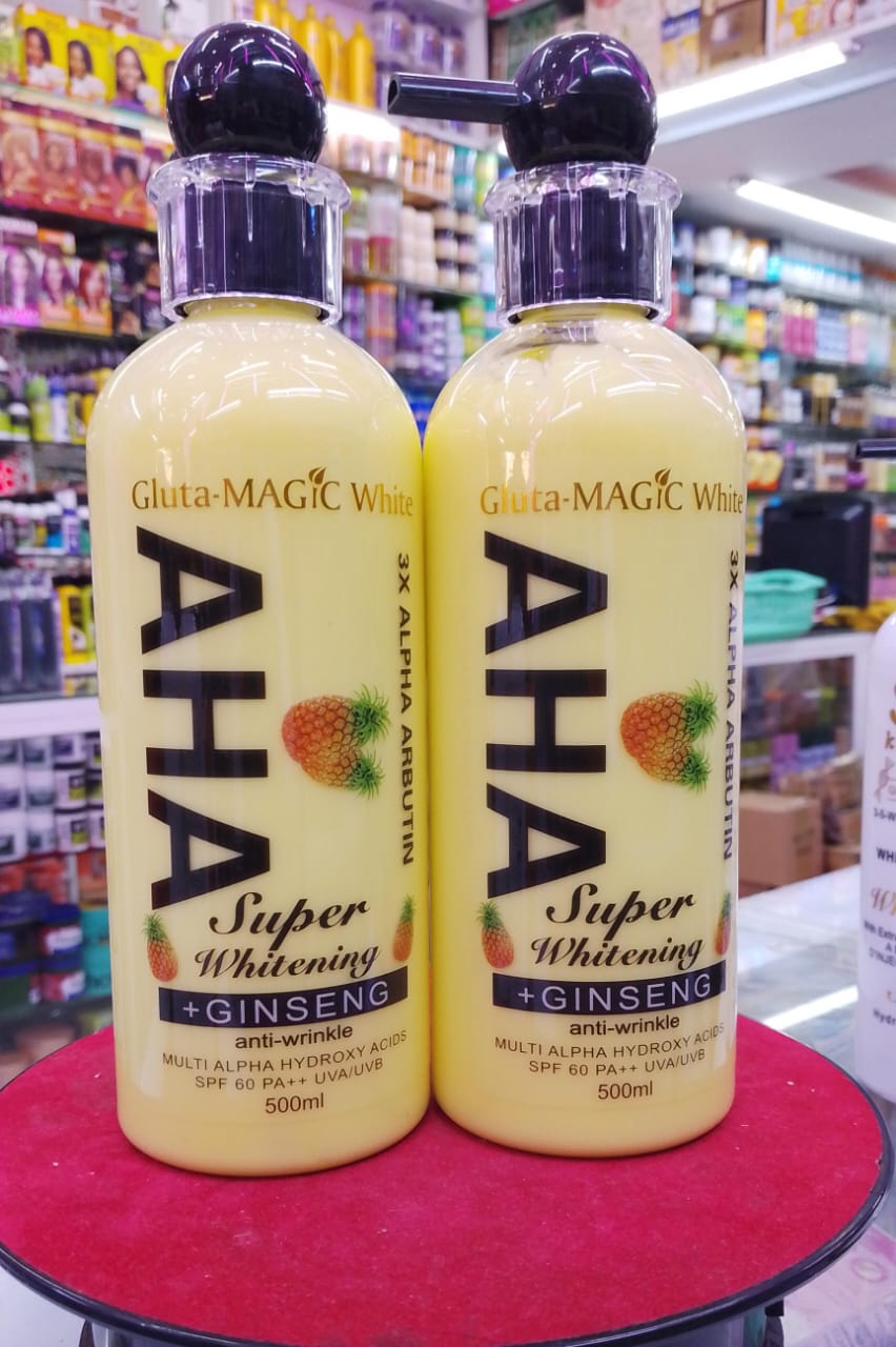Two bottles of AHA Super Whitening + Ginseng product on a red surface with a store shelf in the background.