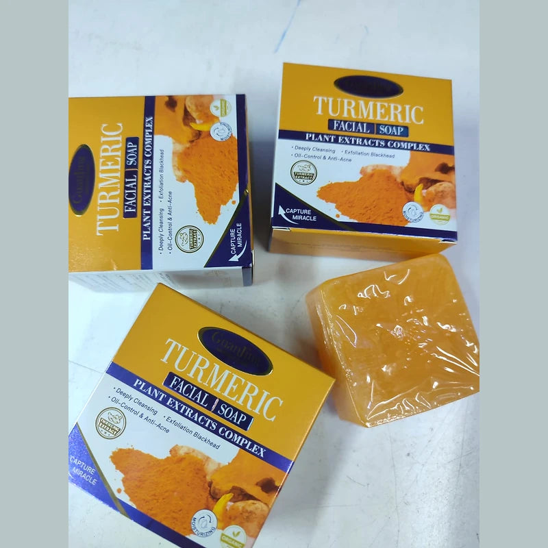 Turmeric facial soap with packaging on a white background