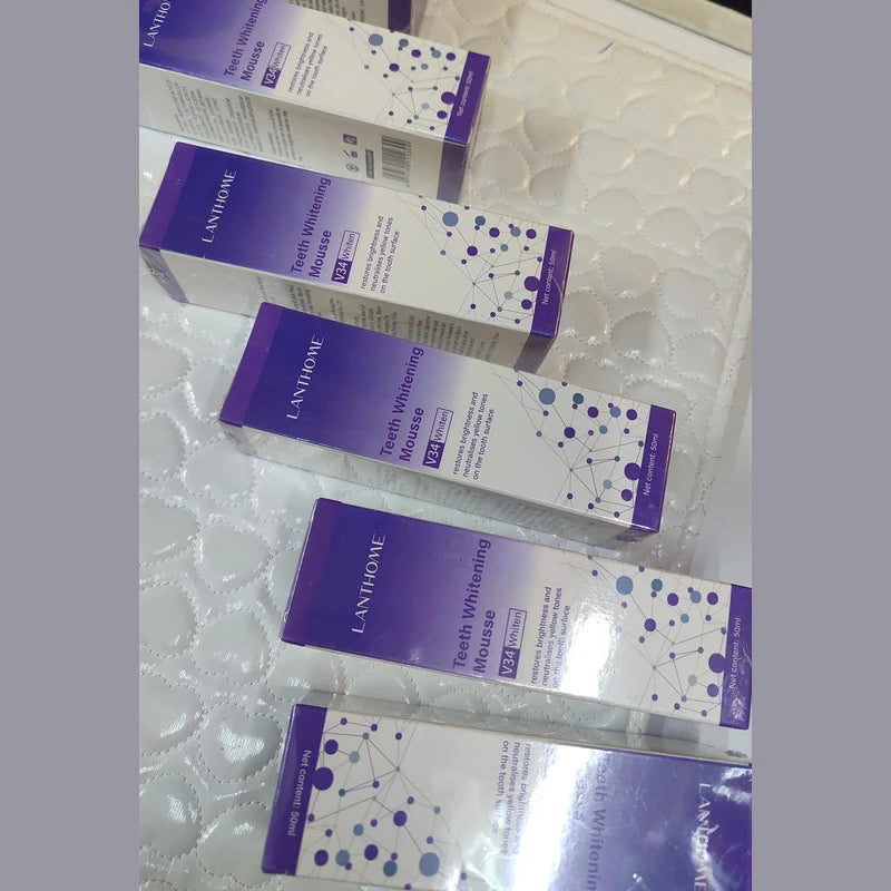 Multiple Lanbore tooth whitening products on a textured surface
