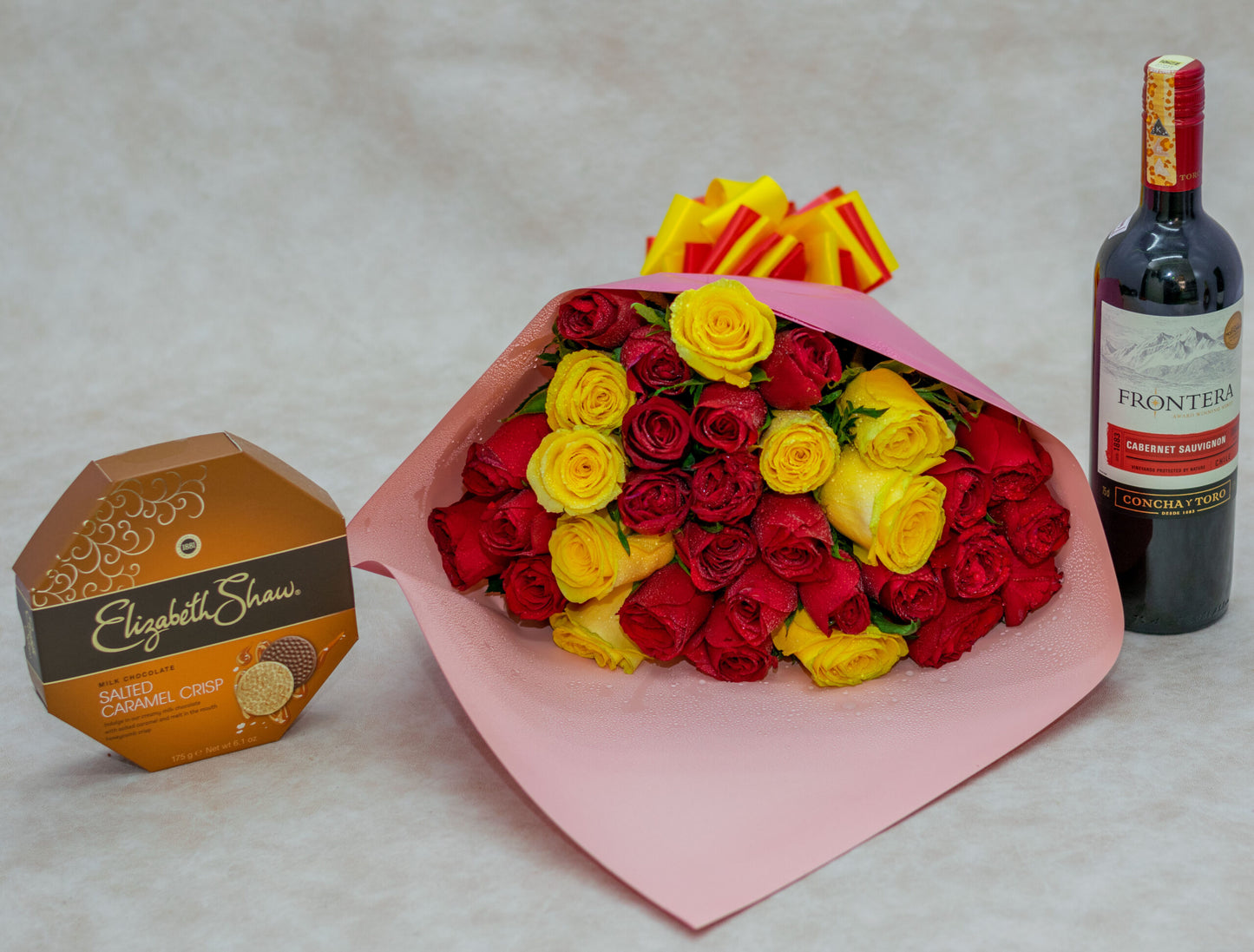 Mixed Red and Yellow Roses Wine and Chocolate