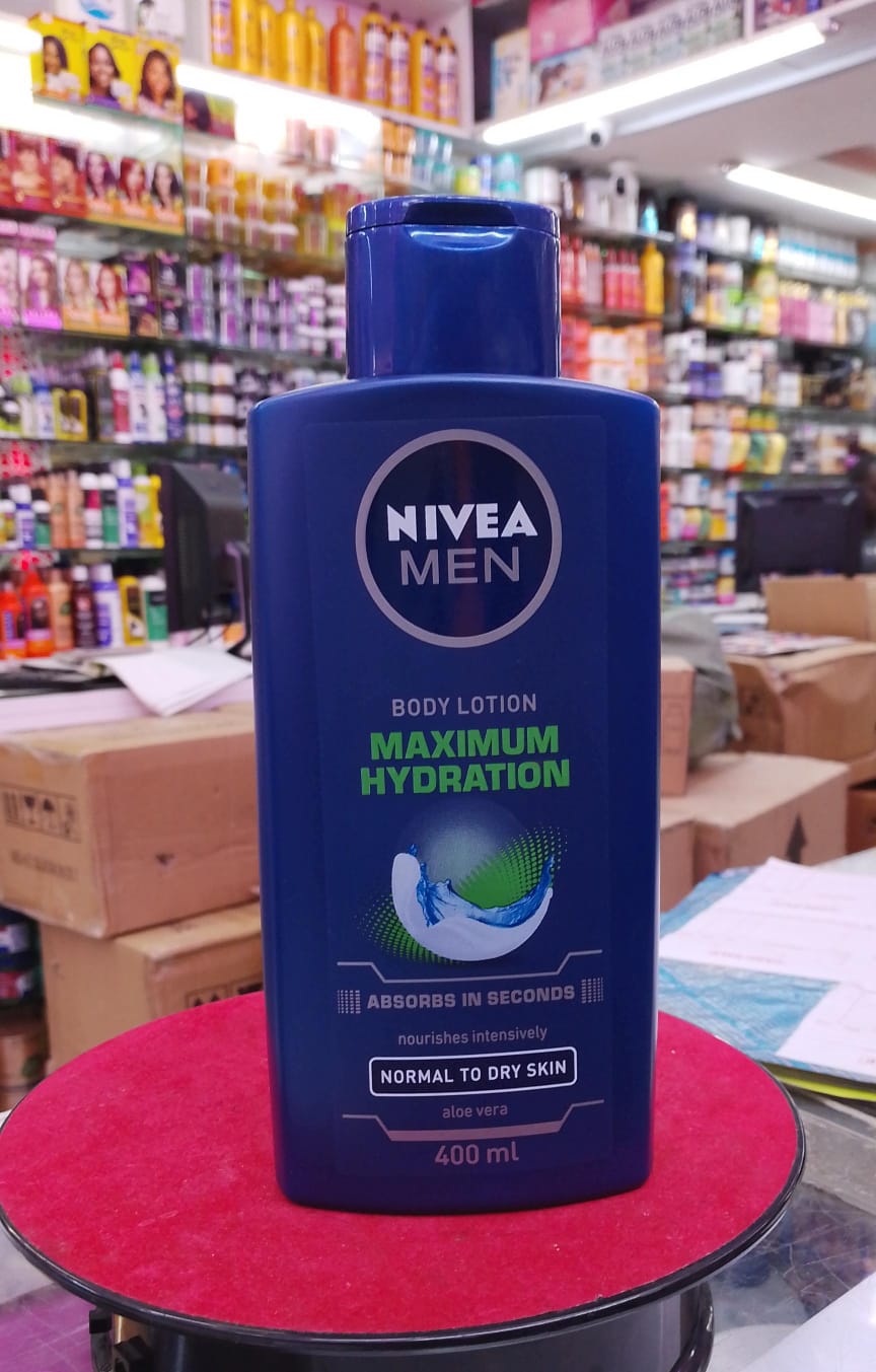 Nivea Men body lotion bottle on a red surface with a store shelf in the background