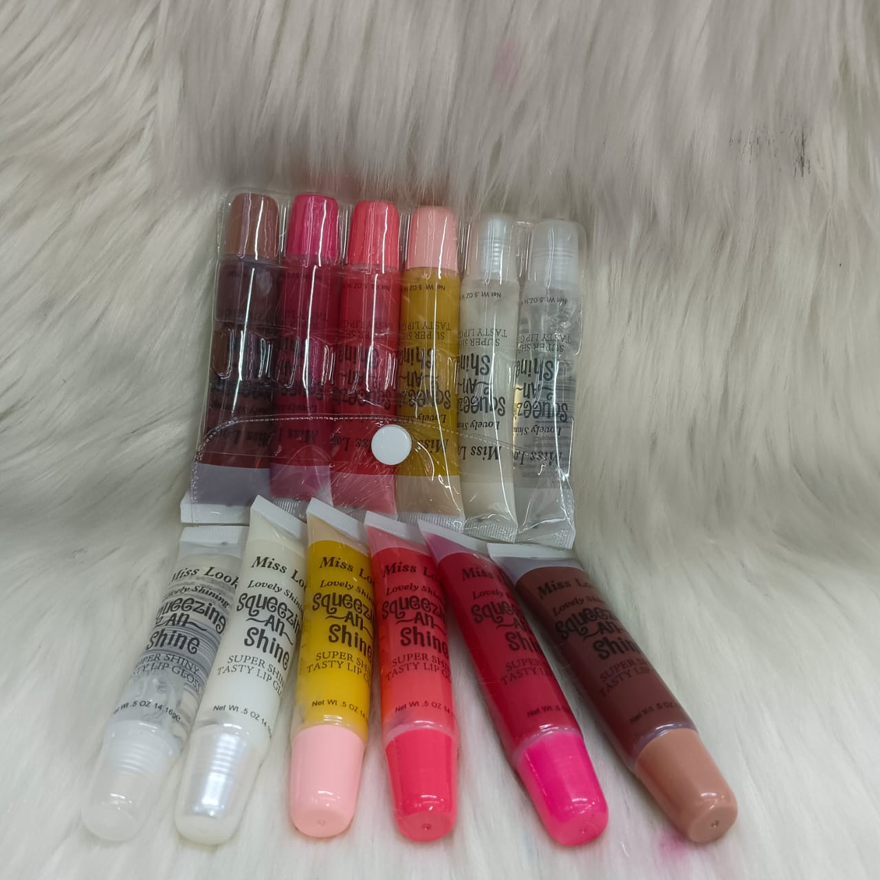 6 PCs Squeeze N Lovely / Shine Lip Gloss , Clear to Colored Tasty and Super Shiny Lipgloss - Miss Look