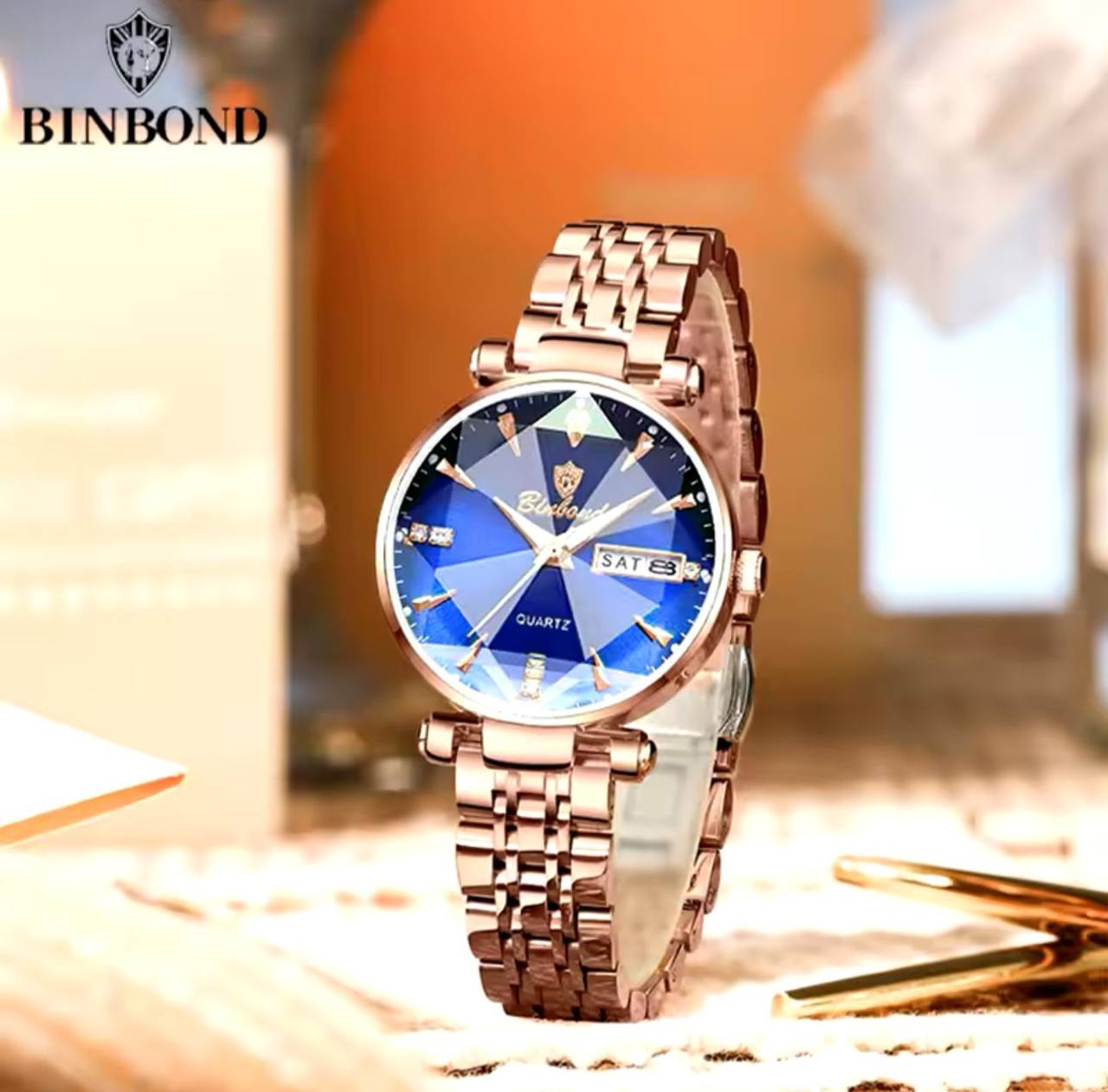 BINBOND LADIES WATER RESISTANT BATTERY POWERED NON FADE STEEL POLISH DAY AND DATE DISPLAY AND ENQUIRIES