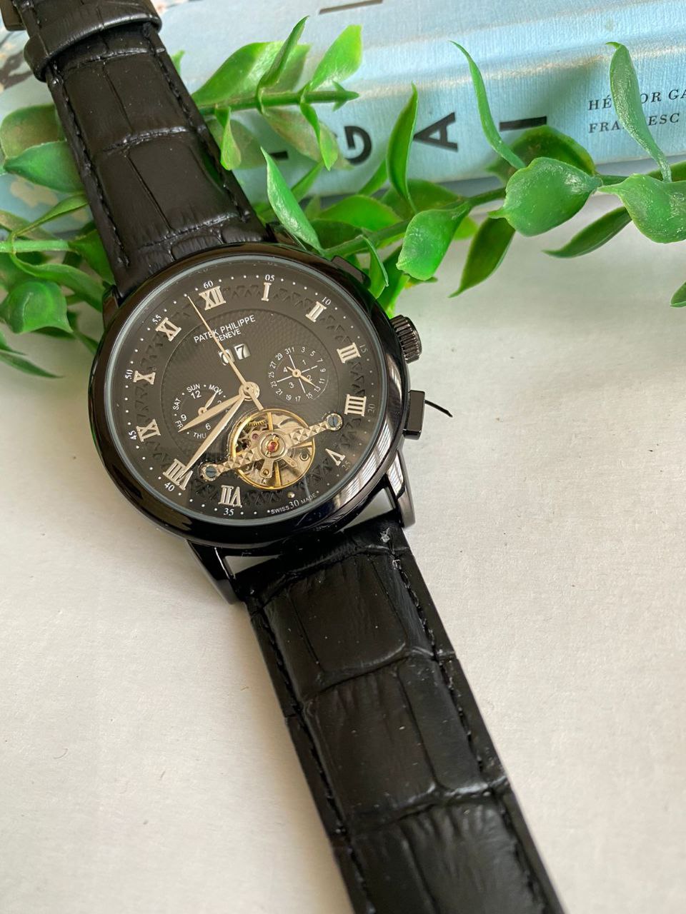 PATEK PHILLIPE AUTOMATIC CHRONOGRAPH WATER RESISTANT DATE DISPLAY