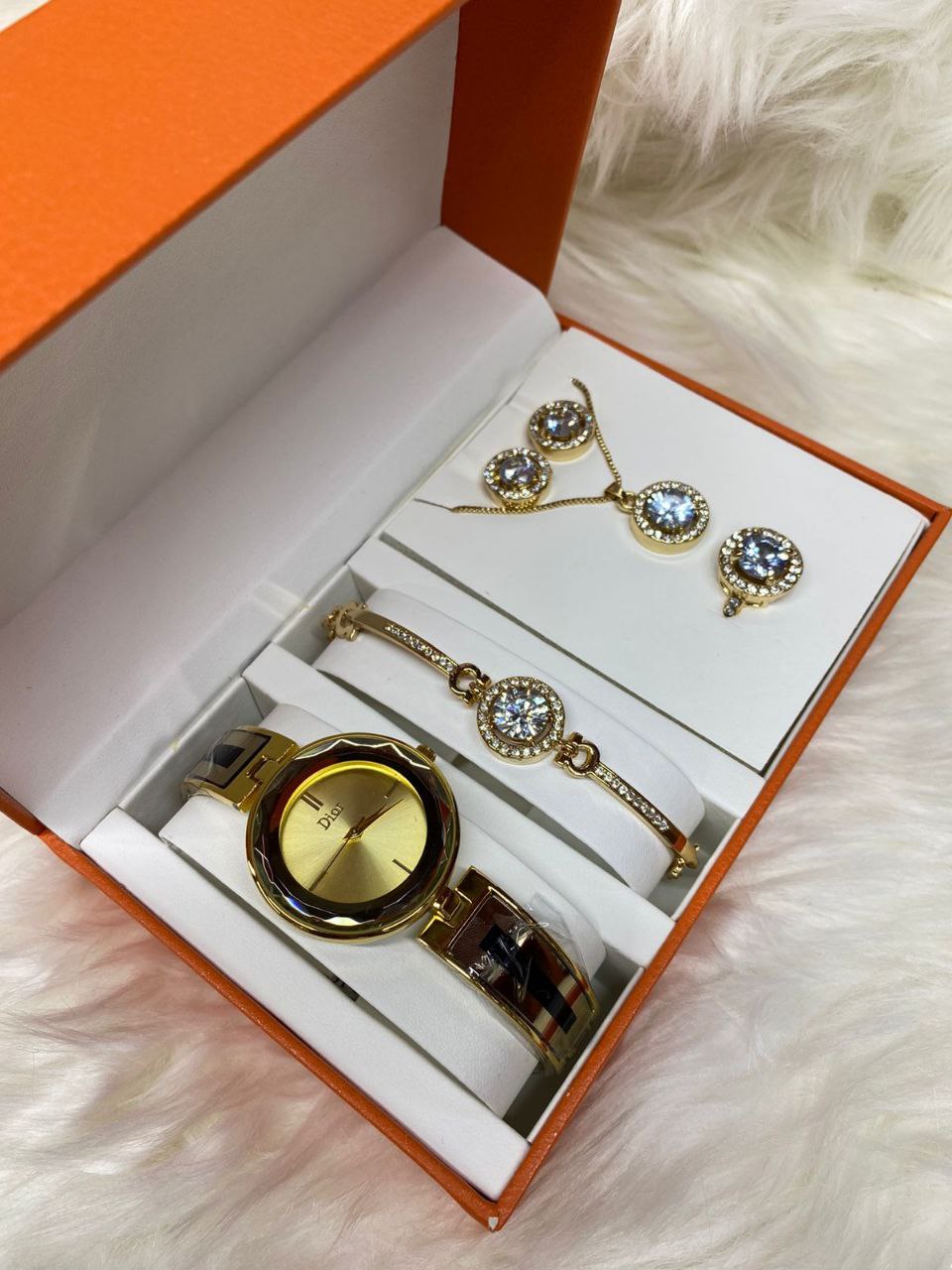 A SET OF WATCH BRACELET NECKLACE EARRINGS RING