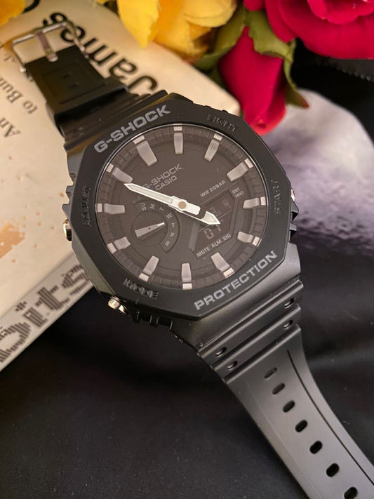 G SHOCK CASIO WATER RESIST SHOCK RESIST FUNCTIONAL CHRONOGRAPHS RUBBER STARP LIGHT BUTTON BATTERY POWERED G SHOCK TIN