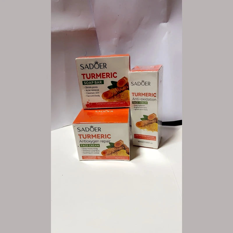 Sadoer Turmeric skincare products including soap bar, face cream, and anti-oxidant repair on a white background.