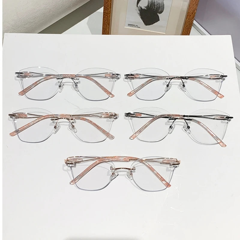 TFTB 2025 Women's Fashion Cat Eye Rimless Glasses Ultra-light Trendy Alloy High-end Optical Prescription Eyeglasses Frame 19028