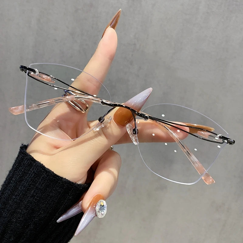 TFTB 2025 Women's Fashion Cat Eye Rimless Glasses Ultra-light Trendy Alloy High-end Optical Prescription Eyeglasses Frame 19028