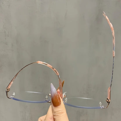 TFTB 2025 Women's Fashion Cat Eye Rimless Glasses Ultra-light Trendy Alloy High-end Optical Prescription Eyeglasses Frame 19028