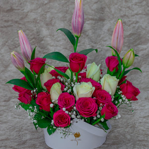 A Flower Basket of Tiger Lilies, Red and White Roses