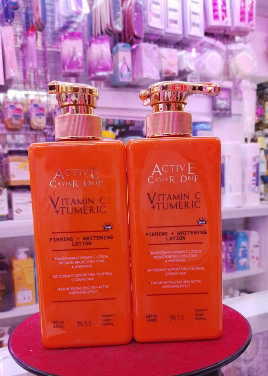 Two bottles of Active Caviar Lotion on a round surface with a store shelf in the background.