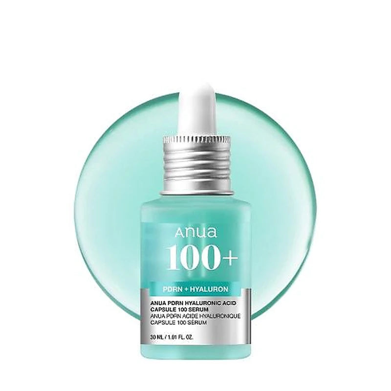 Anua 100+ serum bottle with dropper on a white background