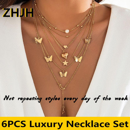 6PCS Ladies' Necklace Luxury Set Butterfly Tassel Layered Moon Pearl Pentagram Set Collarbone Chain Metal Chain Heart Necklace Versatile Personality 6 Mixed And Matched Light Luxury Deluxe Gifts