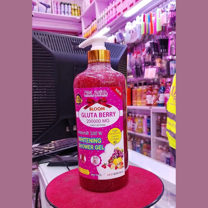 Bottle of Bloom Gluta Berry shower gel on a counter in a store.