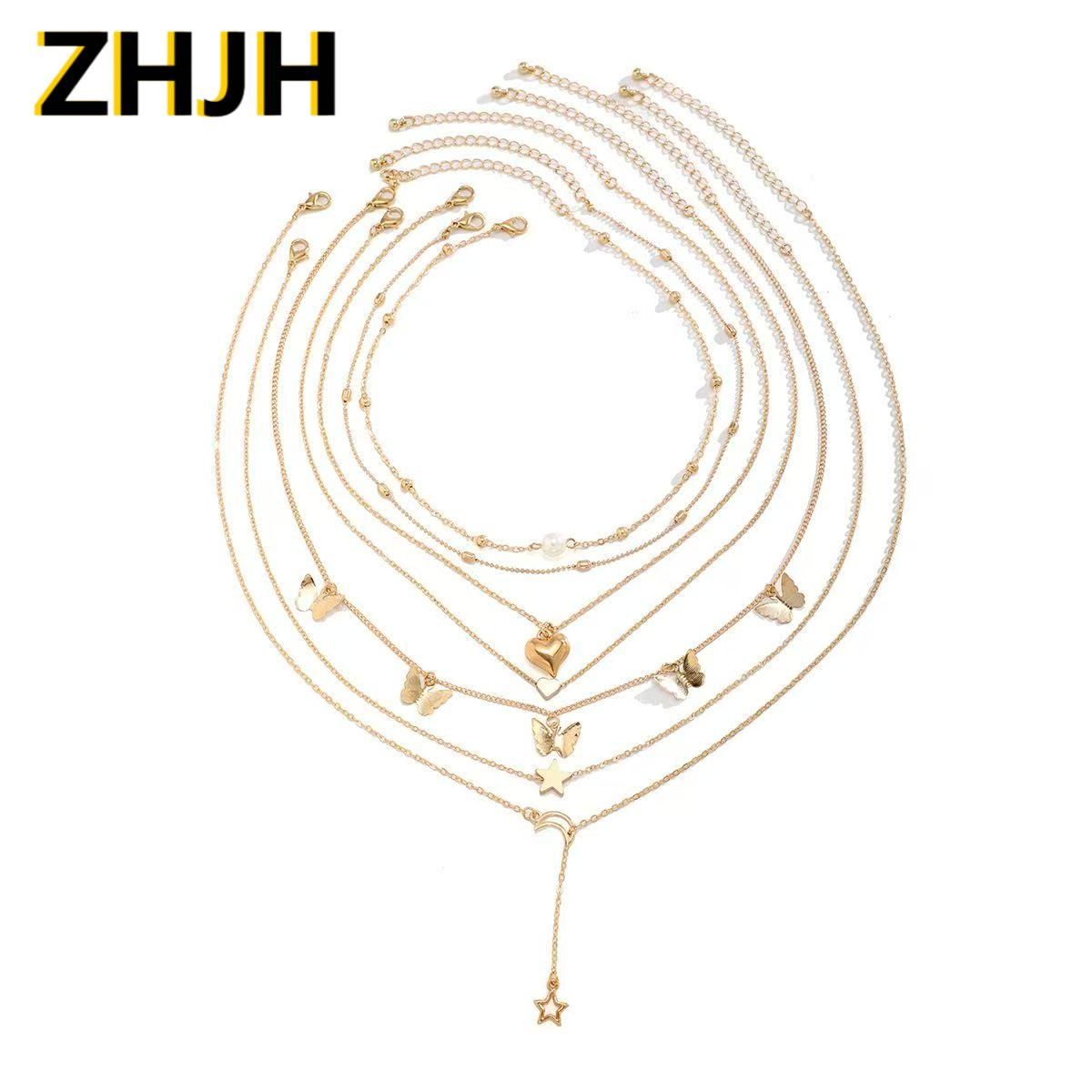 6PCS Ladies' Necklace Luxury Set Butterfly Tassel Layered Moon Pearl Pentagram Set Collarbone Chain Metal Chain Heart Necklace Versatile Personality 6 Mixed And Matched Light Luxury Deluxe Gifts