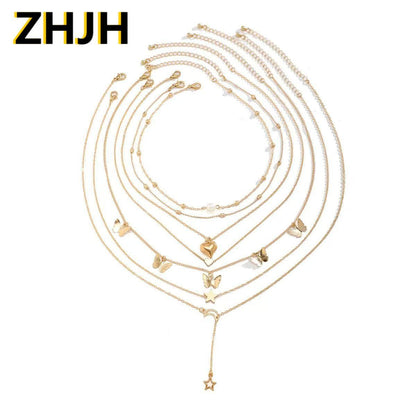 6PCS Ladies' Necklace Luxury Set Butterfly Tassel Layered Moon Pearl Pentagram Set Collarbone Chain Metal Chain Heart Necklace Versatile Personality 6 Mixed And Matched Light Luxury Deluxe Gifts