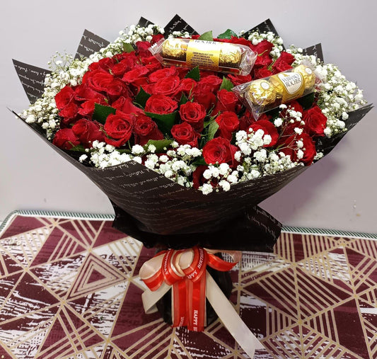 Bouquet of red roses and ferrero chocolates