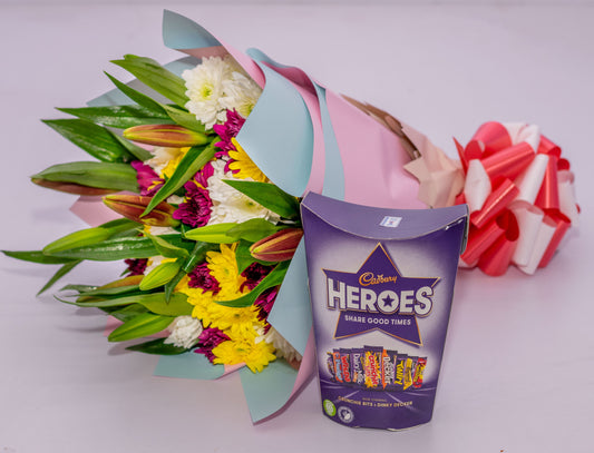 Bright Bouquet of Tiger Lilies and a Packet Of Cadbury Heroes Chocolates.