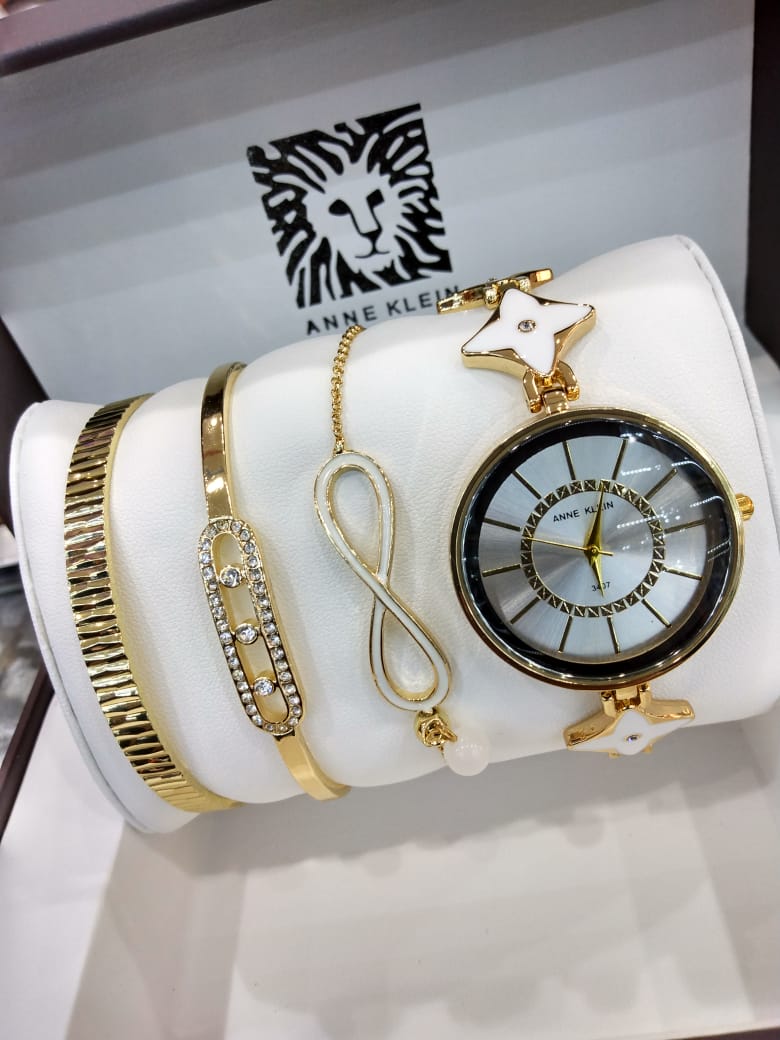 Anne Klein Watch Set – Elegant Quartz Watch & Bracelet Bundle with Crystal Accents, Mother-of-Pearl Dial, Jewelry Clasps & Splash-Resistant Design for Timeless Style