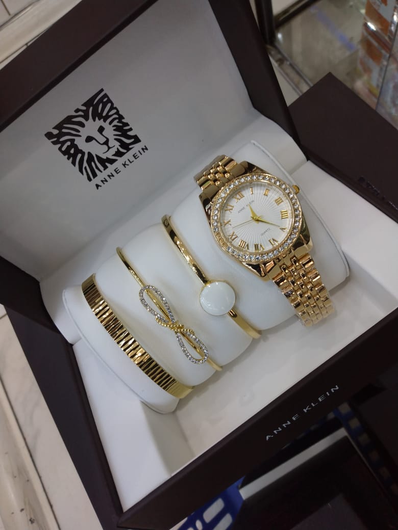 Anne Klein Watch Set – Elegant Quartz Watch & Bracelet Bundle with Crystal Accents, Mother-of-Pearl Dial, Jewelry Clasps & Splash-Resistant Design for Timeless Style