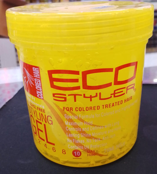 Yellow jar of Eco Styler styling gel for colored treated hair on a dark surface.