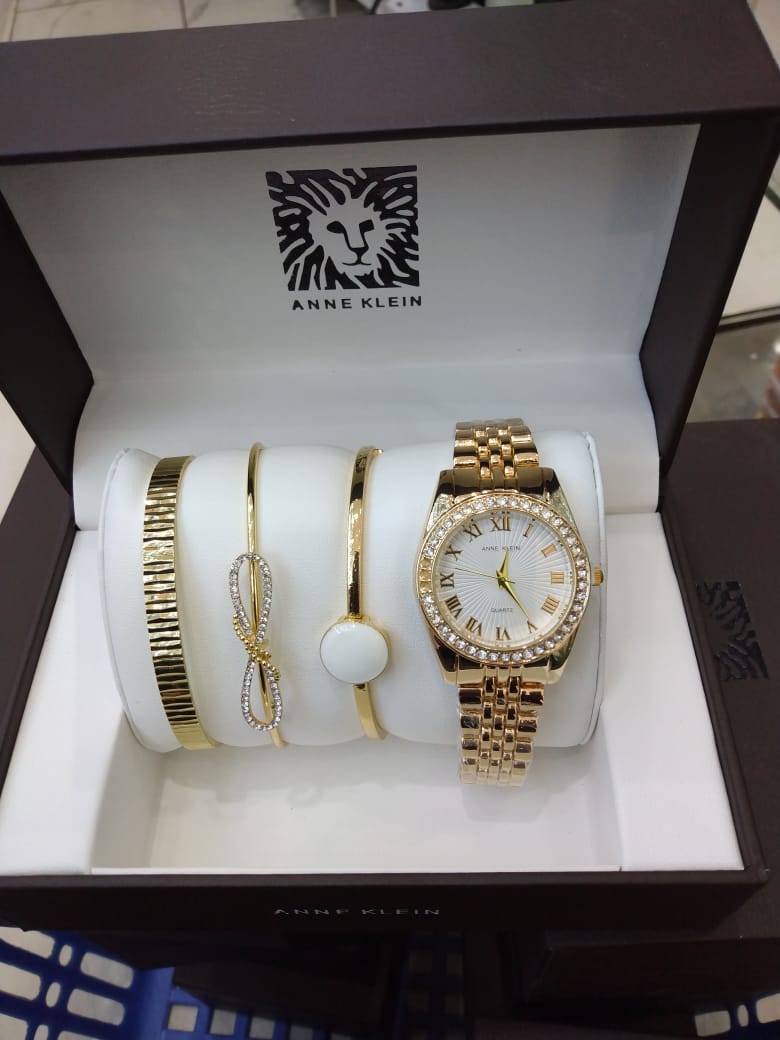 Anne Klein Watch Set – Elegant Quartz Watch & Bracelet Bundle with Crystal Accents, Mother-of-Pearl Dial, Jewelry Clasps & Splash-Resistant Design for Timeless Style