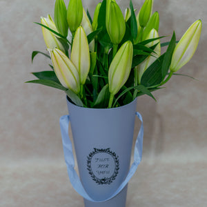 Flower Bouquet of Tiger Lilies in a Blue Vase