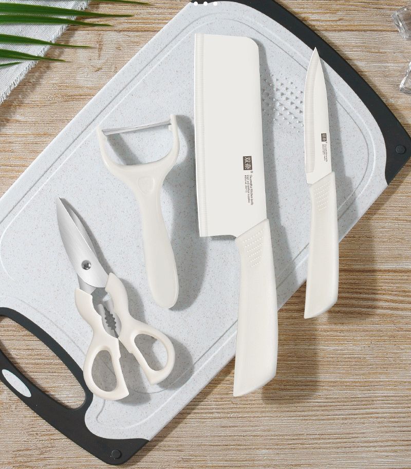 Four piece set of kitchen knives, milk and cabbage knives, internet famous and popular kitchen knives, slicing knives, fruit knives, peeling knives, scissors combination set