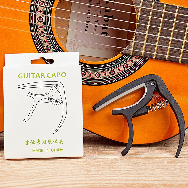 Premium Nylon Guitar Capo - Quick Change Clamp for Easy Tone Adjustment - Fits Acoustic, Classic, Electric Guitars and Ukuleles