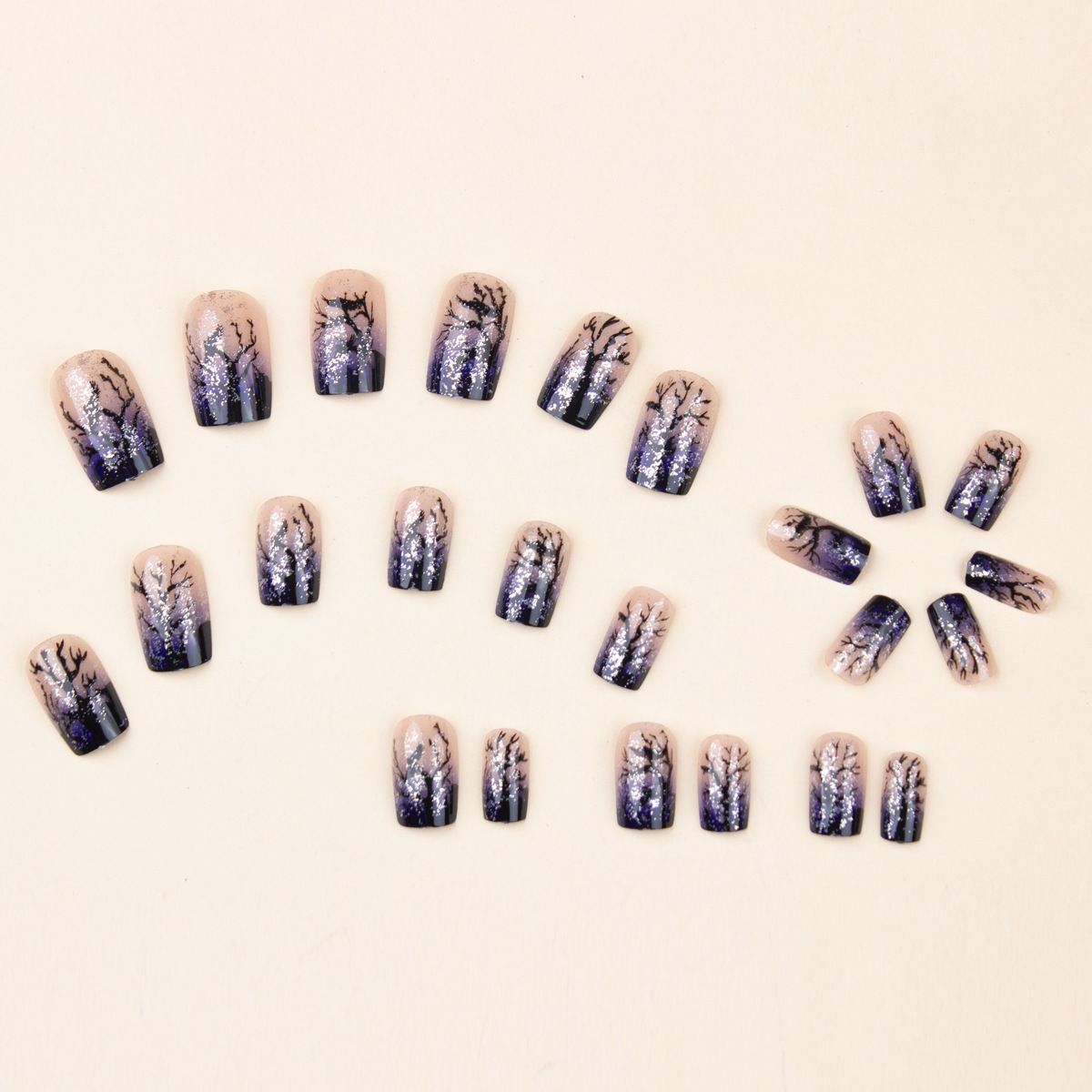 Medium to long square wearing nail, black withered tree silhouette nail art, light blue gradient fake nail glitter, detachable nail patch