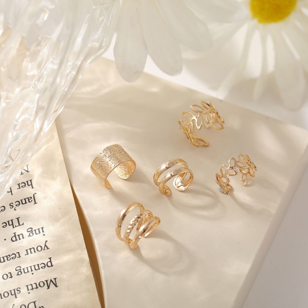 Creative simple no piercing ear bone clip 5-piece personalized gold leaf hollow-out multi-layer earrings C-shaped ear clip has layers