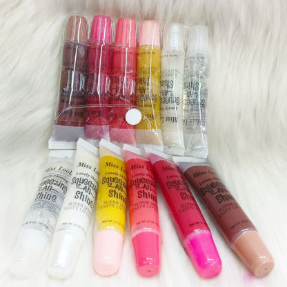 6 PCs Squeeze N Lovely / Shine Lip Gloss , Clear to Colored Tasty and Super Shiny Lipgloss - Miss Look