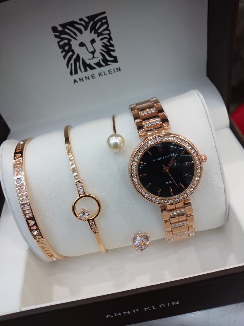 Anne Klein Watch Set – Elegant Quartz Watch & Bracelet Bundle with Crystal Accents, Mother-of-Pearl Dial, Jewelry Clasps & Splash-Resistant Design for Timeless Style
