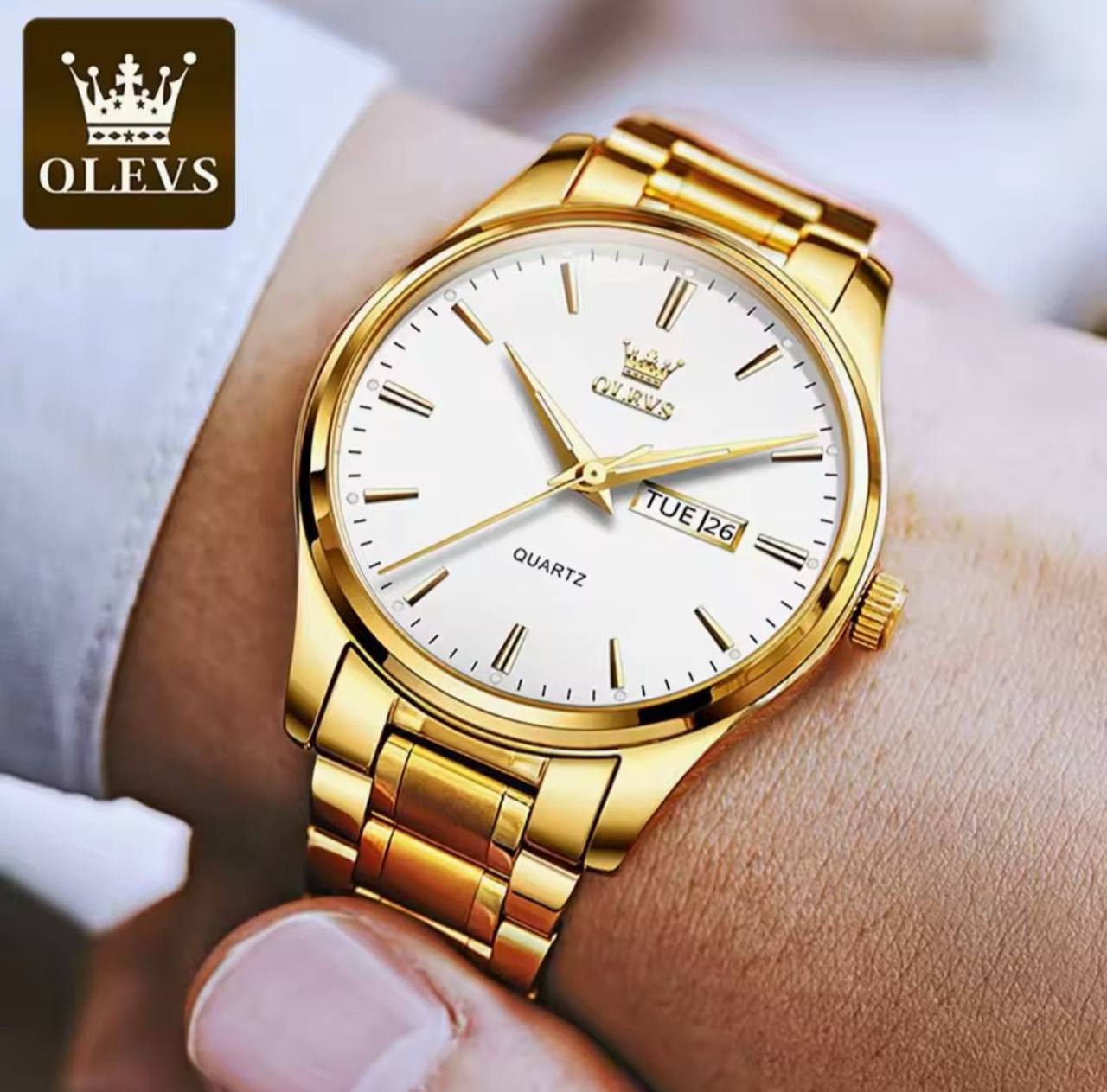 OLEVS MEN WATCH STAINLESS STEEL BATTERY POWERED DAY&DATE DISPLAY WATER RESISTANT HD LUMINOUS OLEVS BRANDED BOX ENQUIRIES
