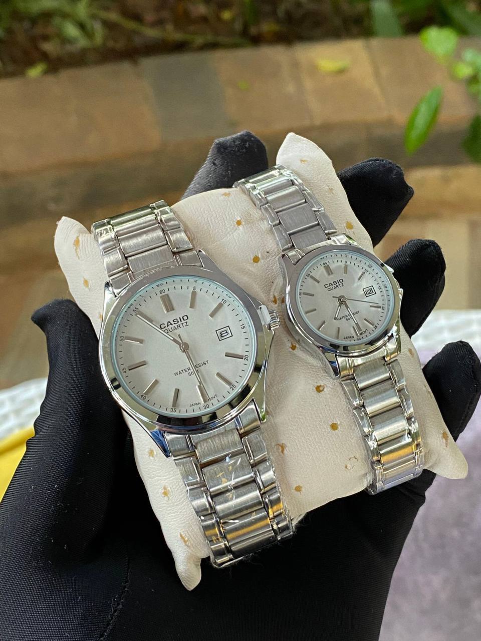 CASIO COUPLE A PAIR SINGLE WATER RESISTANT DATE DISPLAY STAINLESS STEEL FINISH BATTERY POWERED COUPLE BOXES CASIO BRANDED BOX ORDER AND ENQUIRIES