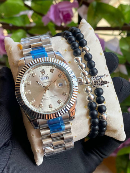 ROLEX X BANGLE DAY AND DATE DISPLAY BATTERY POWERED WATER RESISTANT STAINLESS STEEL ENQUIRIES