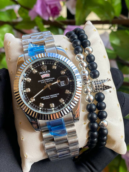 ROLEX X BANGLE DAY AND DATE DISPLAY BATTERY POWERED WATER RESISTANT STAINLESS STEEL ENQUIRIES