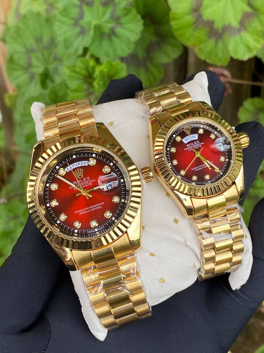 ROLEX COUPLE WATCHES SINGLE PIECE DAY AND DATE DISPLAY WATER RESISTANT BATTERY POWERED ENQUIRIES