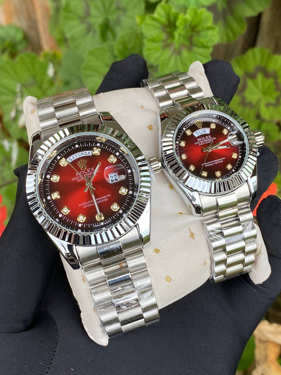 ROLEX COUPLE WATCHES SINGLE PIECE DAY AND DATE DISPLAY WATER RESISTANT BATTERY POWERED ENQUIRIES