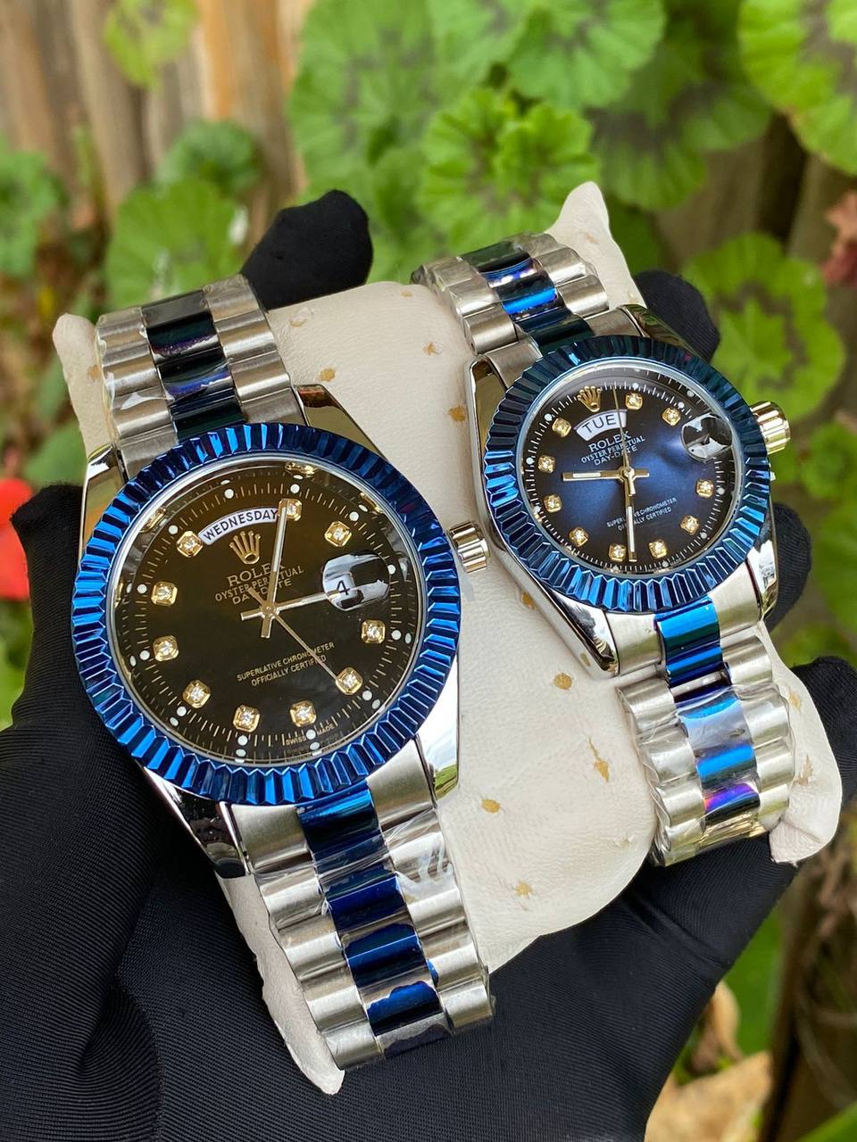 ROLEX COUPLE WATCHES SINGLE PIECE DAY AND DATE DISPLAY WATER RESISTANT BATTERY POWERED ENQUIRIES