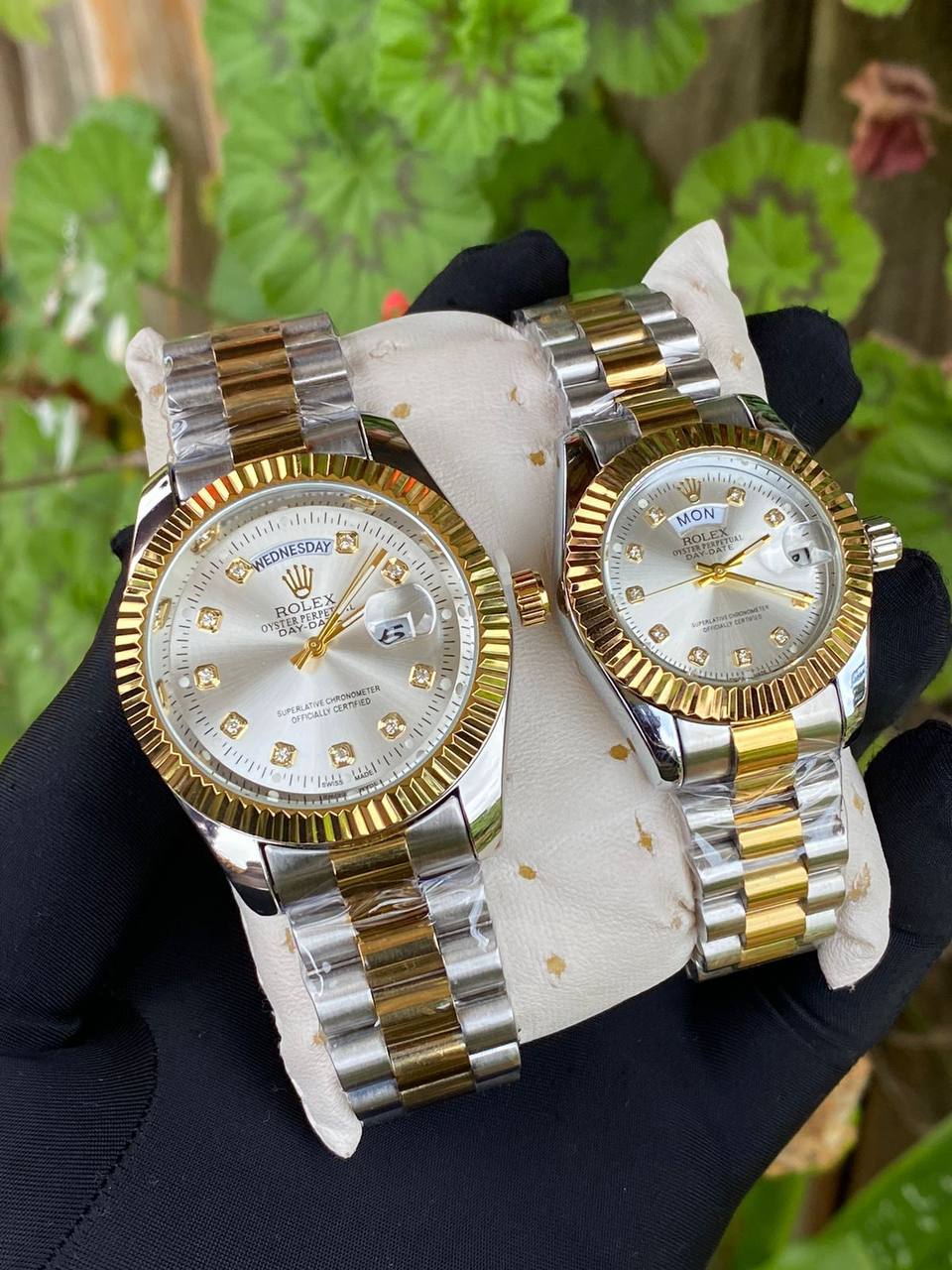 ROLEX COUPLE WATCHES SINGLE PIECE DAY AND DATE DISPLAY WATER RESISTANT BATTERY POWERED ENQUIRIES