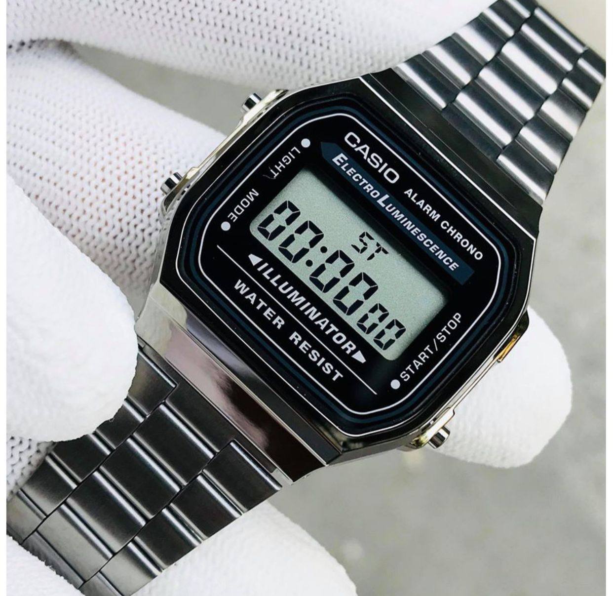 CASIO DIGITAL WATCH LIGHT BUTTON DIGITAL DISPLAY STAINLESS STEEL BATTERY POWERED BLACK&SILVER ENQUIRIES