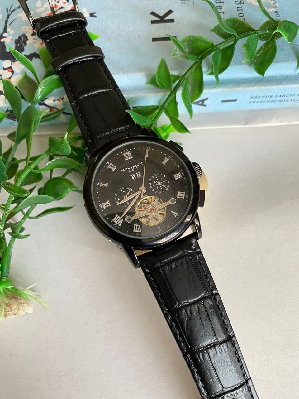 PATEK PHILLIPE AUTOMATIC CHRONOGRAPH WATER RESISTANT DATE DISPLAY