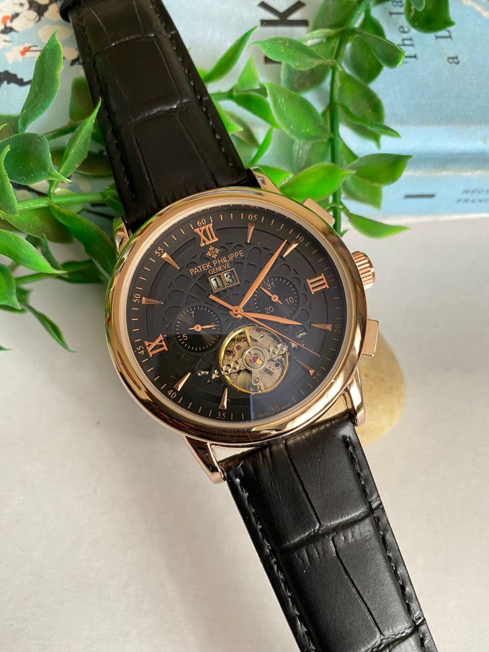 PATEK PHILLIPE AUTOMATIC CHRONOGRAPH WATER RESISTANT DATE DISPLAY