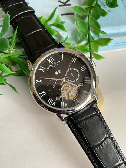 PATEK PHILLIPE AUTOMATIC CHRONOGRAPH WATER RESISTANT DATE DISPLAY